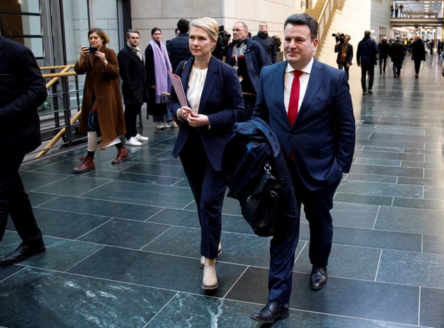 Germany's Labour Minister Hubertus Heil and Manuela Schwesig of the Social Democratic Party (SPD) walk following a meeting between Christian Democratic Union (CDU) leader and Chancellor-in-waiting Friedrich Merz and Lars Klingbeil, co-leader of the Social Democratic Party (SPD), in Berlin, Germany, February 28, 2025. REUTERS/Axel Schmidt
