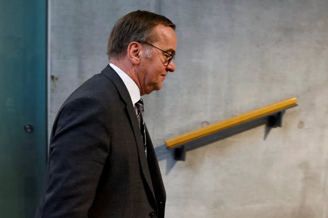 German Defense Minister Boris Pistorius walks following a meeting between Christian Democratic Union (CDU) leader and Chancellor-in-waiting Friedrich Merz and Lars Klingbeil, co-leader of the Social Democratic Party (SPD), in Berlin, Germany, February 28, 2025. REUTERS/Axel Schmidt