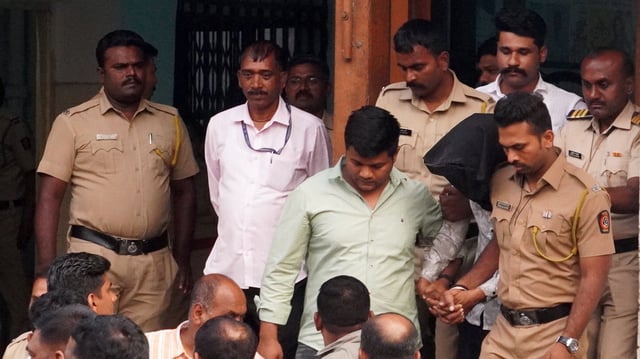 The accused arrested for raping a woman inside a parked state transport bus at Swargate terminus, being produced at a court, in Pune, Friday, Feb. 28, 2025. 