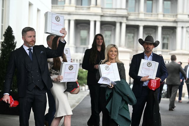 Political commentator Rogan O'Handley, aka DC Draino, TikToker Chaya Raichik, US conservative activist Scott Presler, commentator Liz Wheeler and US conservative political commentator Chad Prather carry binders bearing the seal of the US Justice Department reading "The Epstein Files: Phase 1."