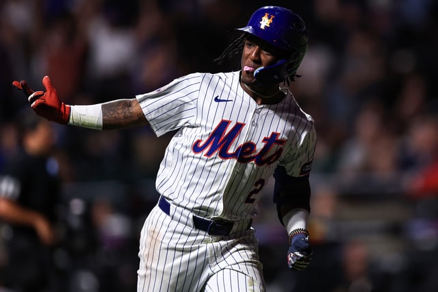 NEW YORK, NEW YORK - SEPTEMBER 17: Luisangel Acuña #2 of the New York Mets reacts after hitting a solo home run during the eighth inning of the game against the Washington Nationals at Citi Field on September 17, 2024 in New York City.