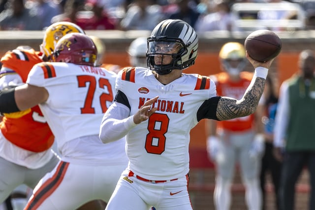 Feb 1, 2025; Mobile, AL, USA; National team quarterback Dillon Gabriel of Oregon (8) throws the ball against the American team during the first half at Hancock Whitney Stadium. Mandatory Credit: Vasha Hunt-Imagn Images/File Photo