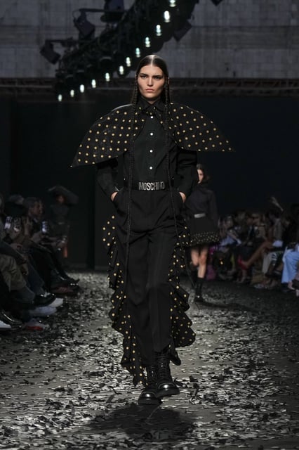 A model wears a creation as part of the Moschino Fall/Winter 2025-2026 Womenswear collection presented in Milan, Italy, Friday, Feb. 28, 2025. (AP Photo/Luca Bruno)