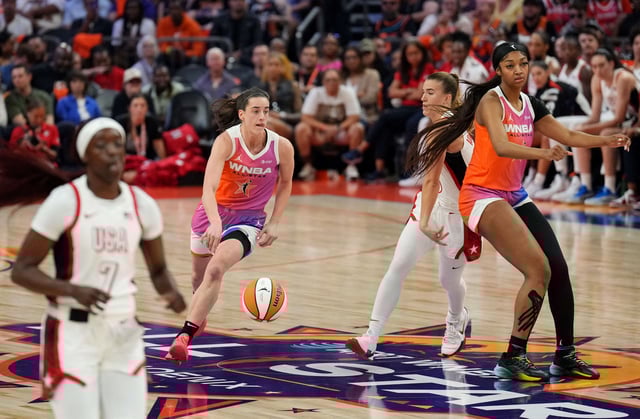 Jul 20, 2024; Phoenix, AZ, USA; Team WNBA forward Angel Reese (5) sets a pick for Team WNBA guard Caitlin Clark (22) during the WNBA All Star Game against USA Women's National Team at Footprint Center. Mandatory Credit: Joe Camporeale-USA TODAY Sports/File Photo