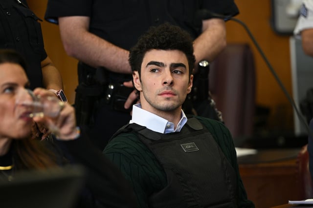 NEW YORK, NEW YORK - FEBRUARY 21: Luigi Mangione appears at a hearing for the murder of UHC CEO Brian Thompson at Manhattan Criminal Court on February 21, 2025 in New York City. Mangione is accused of slaying of UnitedHealthcare CEO Brian Thompson late last year and is making his first appearance on state charges of murder as an act of terrorism. He is facing 11 counts for the Dec. 4 shooting of Thompson outside a midtown Manhattan hotel which set off a massive manhunt. He is also facing federal charges of murder and other charges in Pennsylvania, where he was arrested.