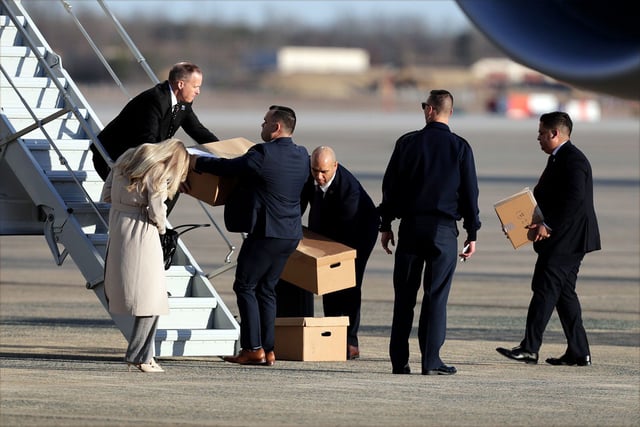 Boxes are loaded onto Air Force One before President Donald Trump's departure at Joint Base Andrews, Md., Friday, Feb. 28, 2025. (AP Photo/Luis M. Alvarez)