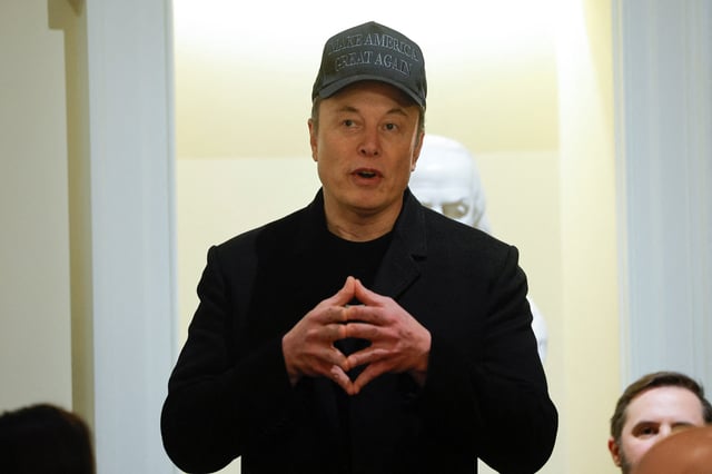 Elon Musk attends the first cabinet meeting hosted by U.S. President Donald Trump, in Washington, D.C.,  U.S., February 26, 2025. REUTERS/Brian Snyder/File Photo