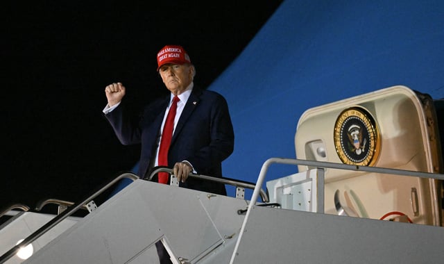 President Donald Trump is pictured exiting Air Force One in West Palm Beach, Florida on February 28, 2025.