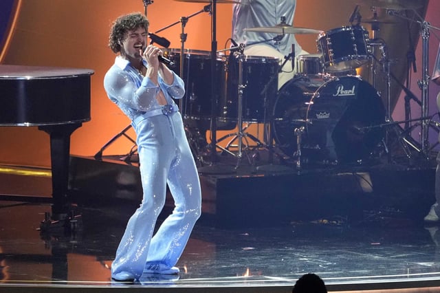 Benson Boone performs during the 67th Grammy Awards at Crypto.com Arena in Los Angeles on Feb. 2. Mark Zuckerberg surprised his wife, Priscilla Chan, on her 40th birthday by taking the stage in the same tight baby-blue jumpsuit.
