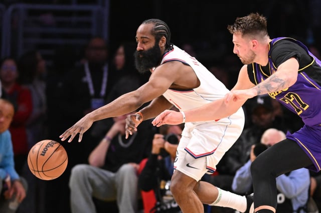 Lakers guard Luka Doncic,, right, knocks the ball away from Clippers guard James Harden during the first half on Friday night at Crypto.com Arena. (Photo by David Crane, Los Angeles Daily News/SCNG)
