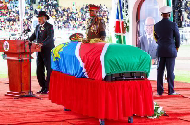 Namibian President Nangolo Mbumba speaks during a memorial service of Sam Nujoma, who became Namibia's first democratically elected president, at the Independence stadium, before his burial tomorrow at Namibia's National Heroes Acre, in the capital Windhoek, Namibia, February 28, 2025. REUTERS/Siphiwe Sibeko