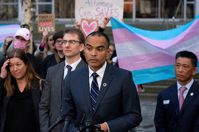 Washington Attorney General Nick Brown speaks to the press after a hearing in the multi-state lawsuit over President Trump's order ending all federal funding or support for healthcare that aids gender transitions for people younger than 19, outside a courthouse in Seattle, Washington, U.S., February 28, 2025.