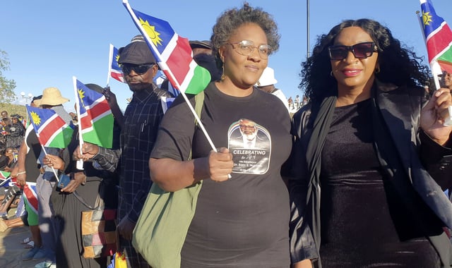 People gather for the state funeral for Namibia's founding president Sam Nujoma at Heroes' Acre, in Windhoek, Namibia, Saturday, March 1, 2025. (AP Photo/Dirk Heinrich)