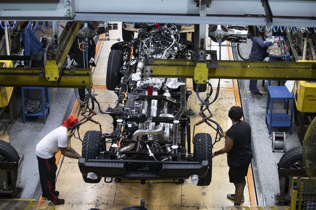 The new Ford F-150 truck goes through the assembly line at the Ford plant in Dearborn, Michigan.