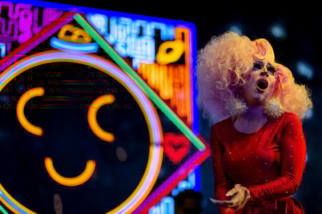 Stock photo showing drag queen Cheri Lake, who performs under the name &#39;Brigitte Bandit,&#39; at the Cheer Up Charlies bar and nightclub on April 02, 2023 in Austin, Texas.