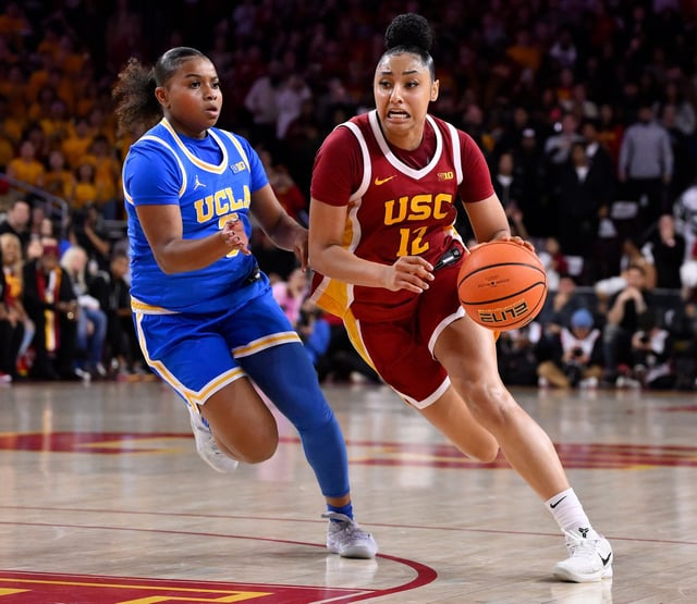 UCLA Bruins guard Londynn Jones (3) pressures USC Trojans guard JuJu Watkins (12) during the fourth quarter at Galen Center.