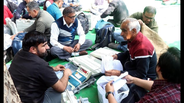 Polling officials preparing for March 2 civic body elections in Rohtak on Saturday. (Manoj Dhaka/HindustanTimes)