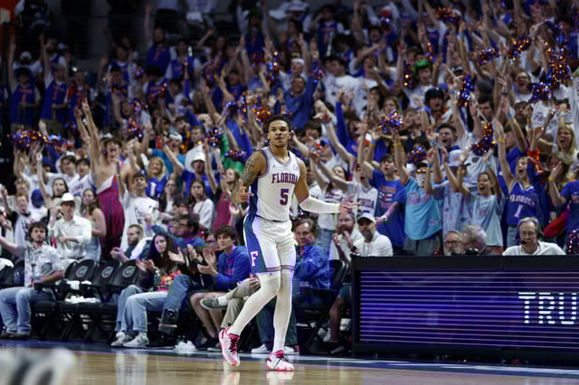 Mar 1, 2025; Gainesville, Florida, USA;  Florida Gators guard Will Richard (5) reacts after a three-point basket against the Texas A&M Aggies during the second half at Exactech Arena at the Stephen C. O'Connell Center. Mandatory Credit: Morgan Tencza-Imagn Images