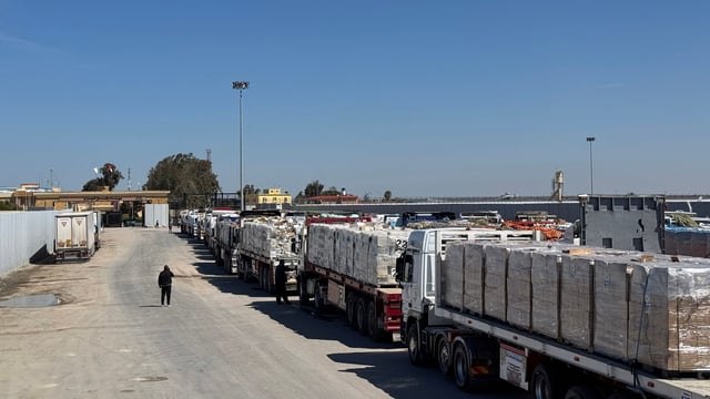 Trucks carrying humanitarian aid line up on the Egyptian side of the Rafah border crossing with the Gaza Strip on March 2, 2025, after Israel suspended the entry of supplies into the Palestinian enclave. 