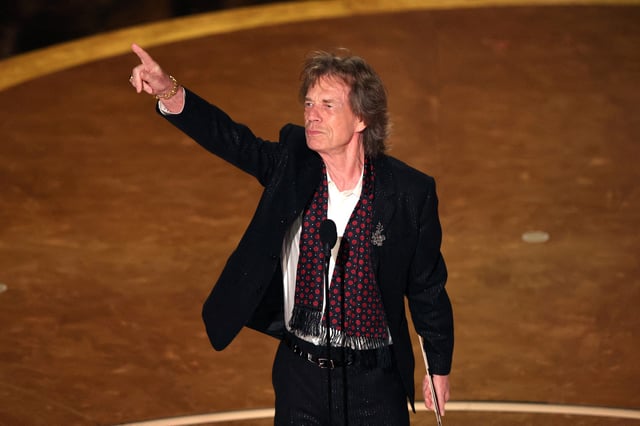 Mick Jagger, who presented the award for best original song at the 2025 Oscars, took a playful jab at Bob Dylan, not pictured, during his segment.