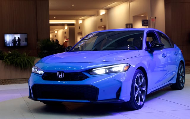 A Honda Civic Hybrid is seen on display after winning the 2025 North American Car of the year award during media day at the 2025 Detroit Auto Show at Huntington Place in Detroit, Michigan, U.S. January 10, 2025.    REUTERS/Rebecca Cook/File Photo