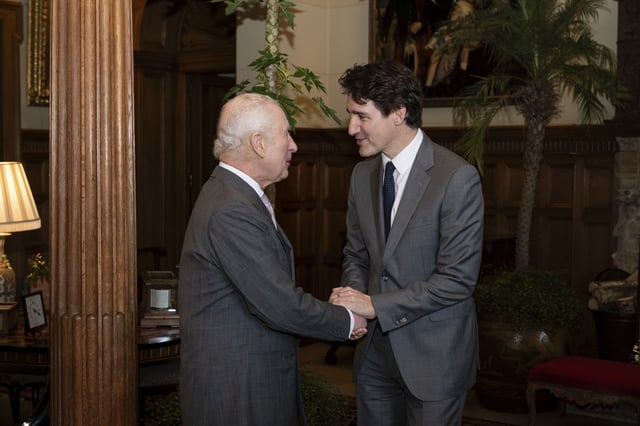 Britain's King Charles III, left, meets Canadian Prime Minister Justin Trudeau at the Sandringham Estate in Norfolk, England, Monday March 3, 2025.