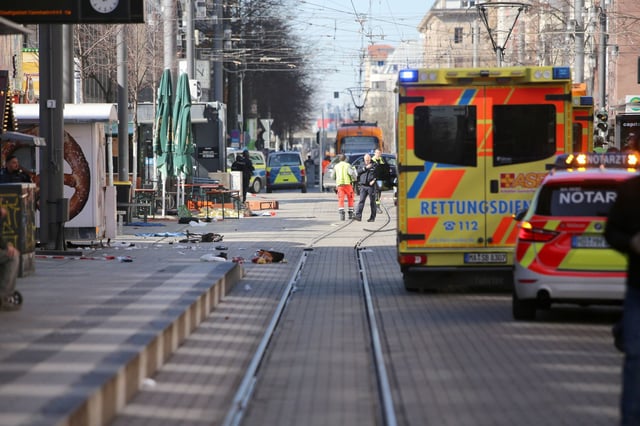 Police respond to an incident at Paradeplatz in the center of Mannheim, Germany, on Monday.