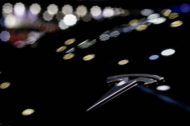 Tesla logo is placed on the vehicle at the 41st Thailand International Motor Expo, in Bangkok, Thailand, November 29, 2024. REUTERS/Athit Perawongmetha/File Photo