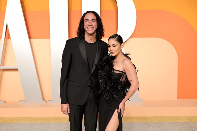 Cole Tucker and Vanessa Hudgens attend the 2025 Vanity Fair Oscar Party Hosted By Radhika Jones at Wallis Annenberg Center for the Performing Arts on March 02, 2025 in Beverly Hills, California.