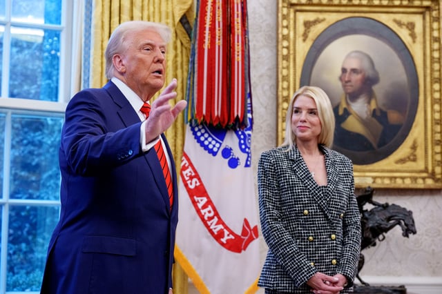 President Donald Trump, accompanied by newly sworn-in US Attorney General Pam Bondi, speaks to member of the media in the Oval Office at the White House on February 5, in Washington, DC.