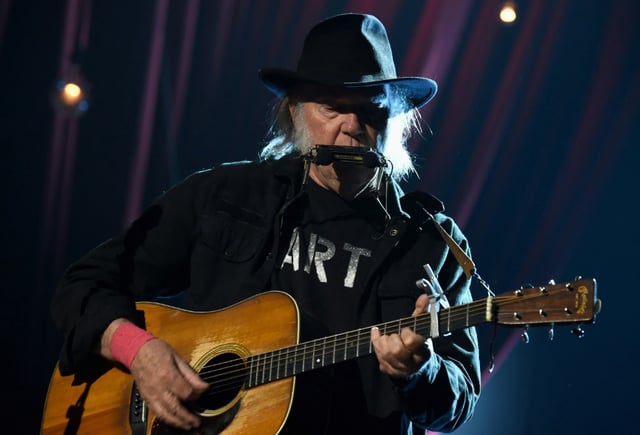 Musician Neil Young, seen here performing onstage in Los Angeles, will open his upcoming Europe tour with a free concert in Ukraine