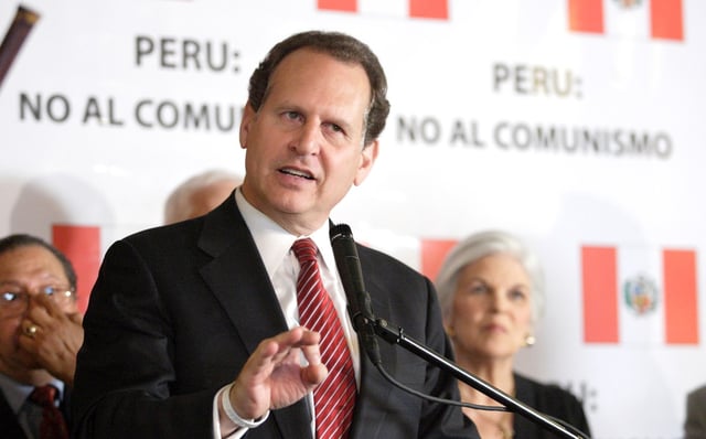Former Congressman Lincoln Diaz-Balart, forefront, speaks during a meeting in El Chaman restaurant in Kendall on Monday, May 16, 2011. Staff photo/South Florida Sun Sentinel