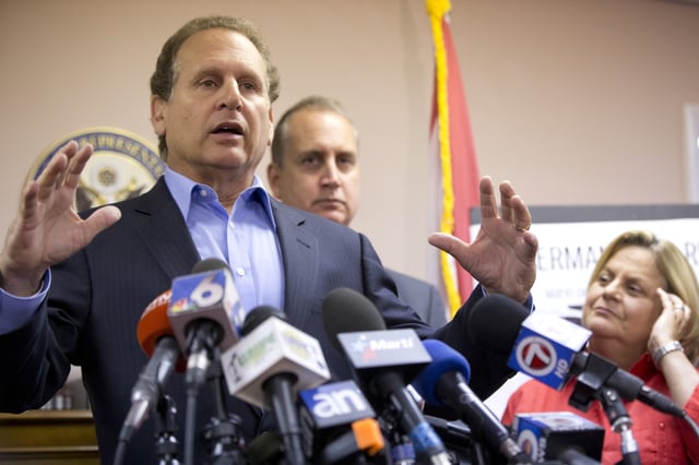 FILE - Former Congressman Lincoln Diaz-Balart speaks while joined by his brother U.S. Rep. Mario Diaz-Balart, R-Fla., center, and U.S. Rep. Ileana Ros-Lehtinen, R-Fla., right, as they discuss their views on the opening of the American embassy in Havana, during a news conference, Aug. 12, 2015, in Miami. (AP Photo/Wilfredo Lee, File)
