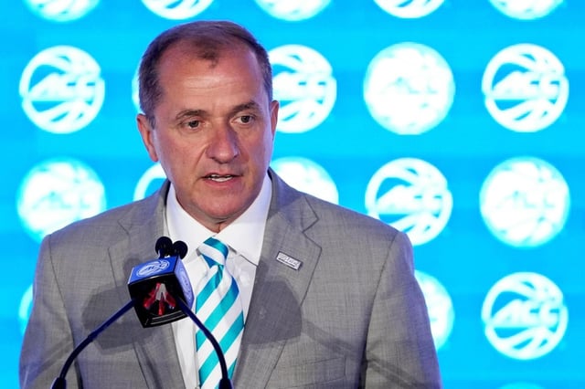 ACC Commissioner Jim Phillips, speaks at a NCAA college basketball media day, Wednesday, Oct. 9, 2024, in Charlotte, N.C. (AP Photo/Chris Carlson)
