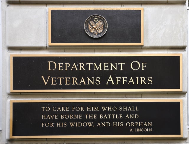 WASHINGTON, D.C. - APRIL 22, 2018: A metal plaque on the facade of the Department of Veterans Affairs building in Washington, D.C., features a quotation by Abraham Lincoln. (Photo by Robert Alexander/Getty Images)