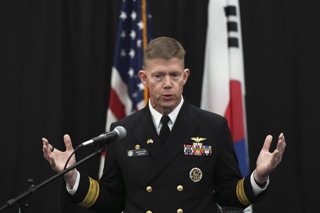 Rear Adm. Michael Wosje, U.S. commander of Carrier Strike Group ONE, speaks to the media at the Nimitz-class nuclear-powered aircraft carrier USS Carl Vinson at a port in Busan, South Korea, Monday, March 3, 2025. (AP Photo/Lee Jin-man, Pool)