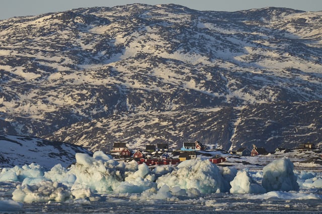 Pieces of ice move through the sea in Qoornoq Island, near Nuuk, Greenland, Monday, Feb. 17, 2025. (AP Photo/Emilio Morenatti)