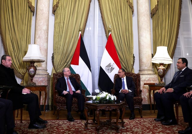 Egypt's Foreign Minister Badr Abdelatty meets with Palestinian Prime Minister Mohammad Mustafa at the Al Tahrir palace to discuss details of the Gaza reconstruction plan, ahead of the emergency Arab summit organised by Egypt this week, in Cairo, Egypt March 3, 2025. REUTERS/Amr Abdallah Dalsh/File Photo