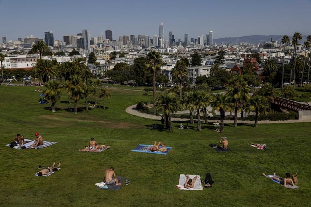 Sunbathers dot the lawn at Dolores Park in San Francisco during a heat wave on Oct. 1.