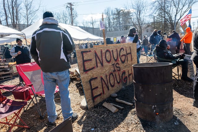 NAPANOCH, NEW YORK - FEBRUARY 28: New York correctional officers and sergeants continue their strike for a second week outside of the Ulster and Eastern Correctional Facilities on February 28, 2025 in Napanoch, New York. The prison workers say they want to roll back the 2022 HALT Act, which has reduced solitary confinement because it caused assaults on them to rise. While it's unclear if the strike has played a role, two more New York inmates have died during an ongoing strike. The Department of Corrections and Community Supervision (DOCCS) has presented a tentative agreement to the New York State Correctional Officers & Police Benevolent Association (NYSCOPBA) to end the ongoing strike, but many guards say their demands have not been met and they won't show up to work on Saturday.  (Photo by Spencer Platt/Getty Images)