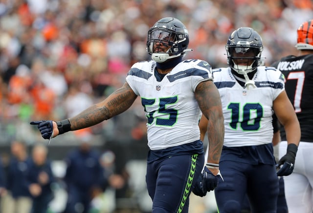 Oct 15, 2023; Cincinnati, Ohio, USA;  Seattle Seahawks defensive end Dre'Mont Jones (55) celebrates the sack during the third quarter against the Cincinnati Bengals at Paycor Stadium. Mandatory Credit: Joseph Maiorana-USA TODAY Sports/File Photo