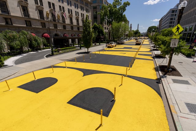 FILE - The letters at Black Lives Matter Plaza have been repainted after the street was repaved near the White House in Washington, May 13, 2021. (AP Photo/Andrew Harnik, file)