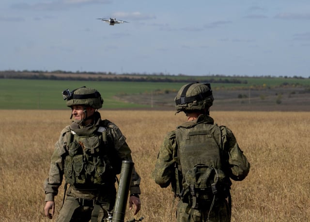 Russian reservists conscripted for military service during a partial mobilization undergo additional training at a training ground in Kherson on October 13, 2022.