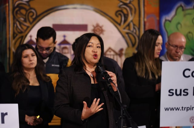 Illinois State Rep. Theresa Mah speaks to people attending a “Know Your Rights” gathering organized by immigrant advocates in Chicago’s Pilsen neighborhood on Nov. 7, 2024. (Chris Sweda/Chicago Tribune)