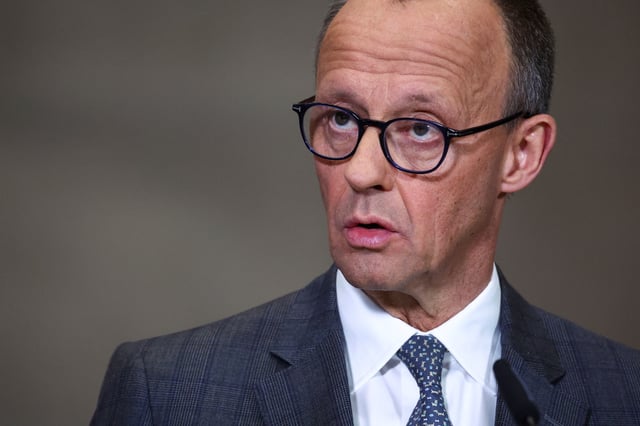 Friedrich Merz, Germany's chancellor-in-waiting and leader of the Christian Democratic Union party CDU looks on as he gives a statement after coalition talks, in Berlin, Germany, March 4, 2025. REUTERS/Lisi Niesner