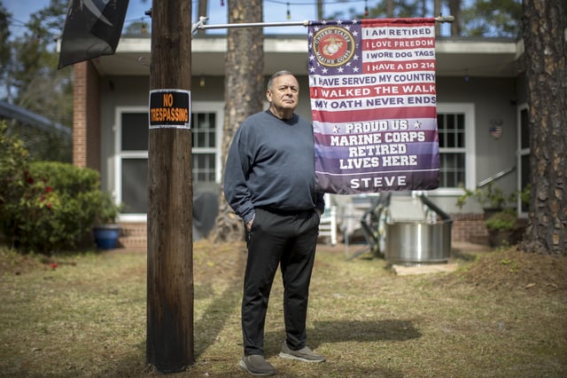 Retired U.S. Marine Stephen Watson stands outside his home, Monday, March 3, 2025, in Jesup, Ga. (Photo/Stephen B. Morton)