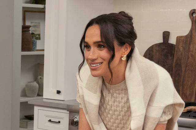 Meghan Markle wears a Loro Piana top and Jenni Kayne jumper while filming her &#39;With Love, Meghan&#39; cooking show for Netflix.