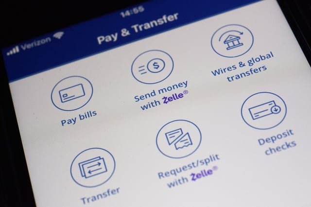 FILE - Options to use the Zelle payments network are seen on a mobile banking app in New York on Friday, Dec. 20, 2024. (AP Photo/Patrick Sison, File)