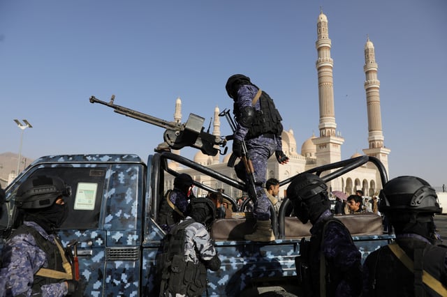 Houthi security personnel stand at the site of a demonstration by protesters, predominantly Houthi supporters, in solidarity with the Palestinians in the Gaza Strip, in Sanaa, Yemen February 14, 2025. REUTERS/Khaled Abdullah/File Photo