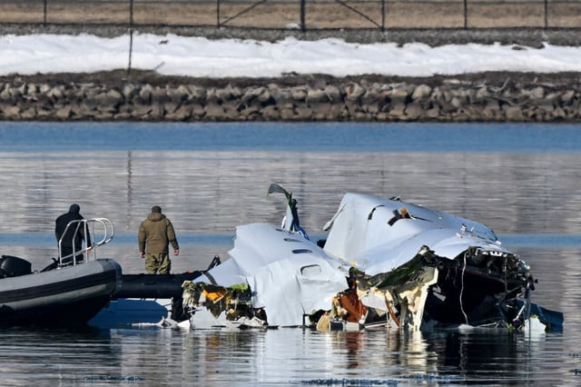 The crash site involving an American Airlines flight and a U.S. Army helicopter in the Potomac River near Ronald Reagan Washington National Airport in January. Six aviation industry leaders appeared before the House Transportation Committee on Tuesday and addressed longstanding issues within the industry, including outdated federal systems and staffing shortages.  (New York TImes/Kenny Holston)